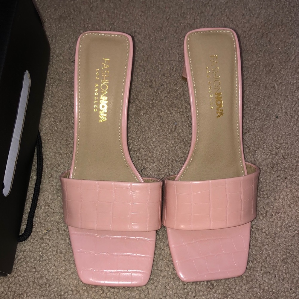 Pink heeled mules
